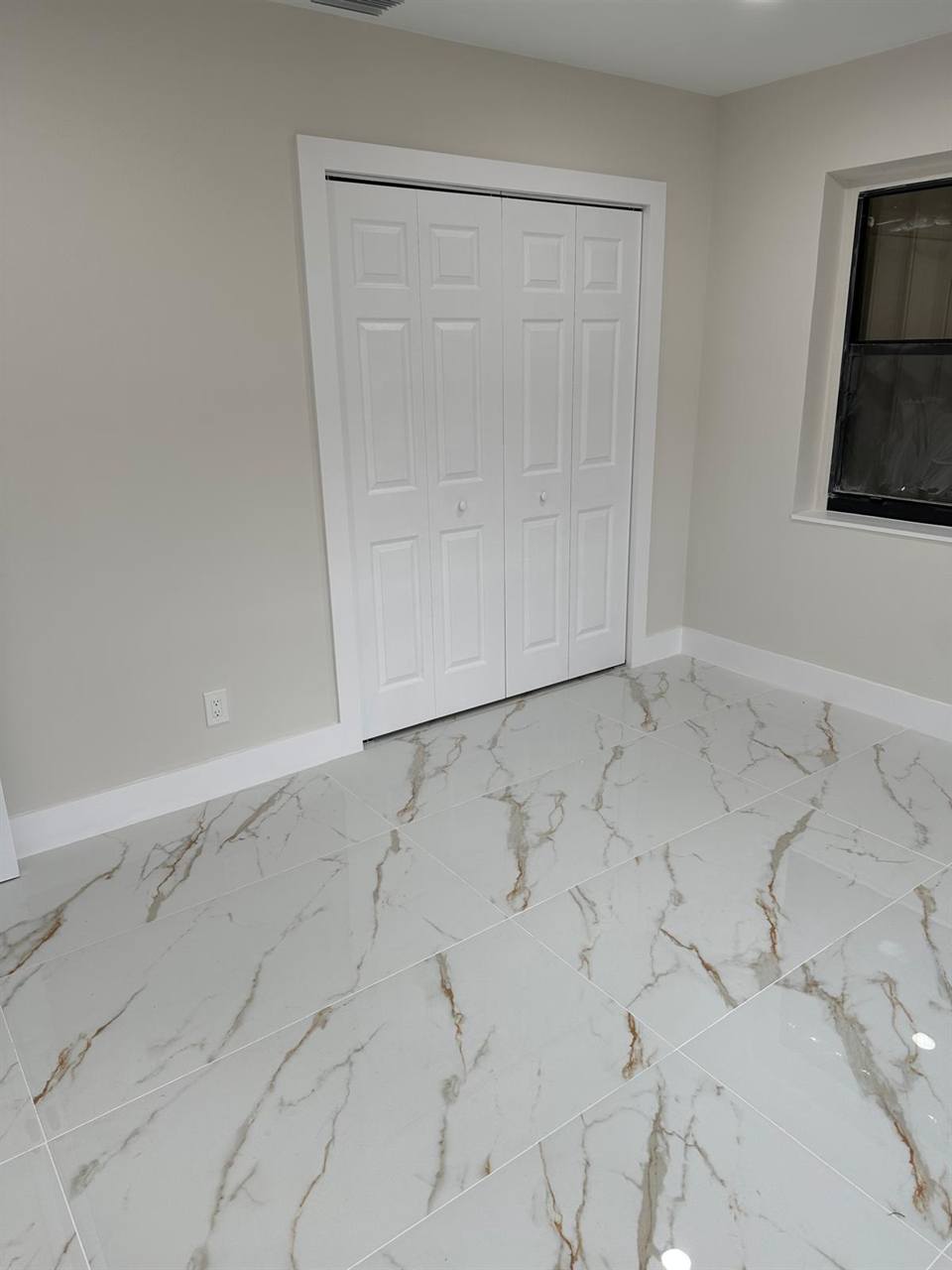 White marble porcelain flooring bedroom