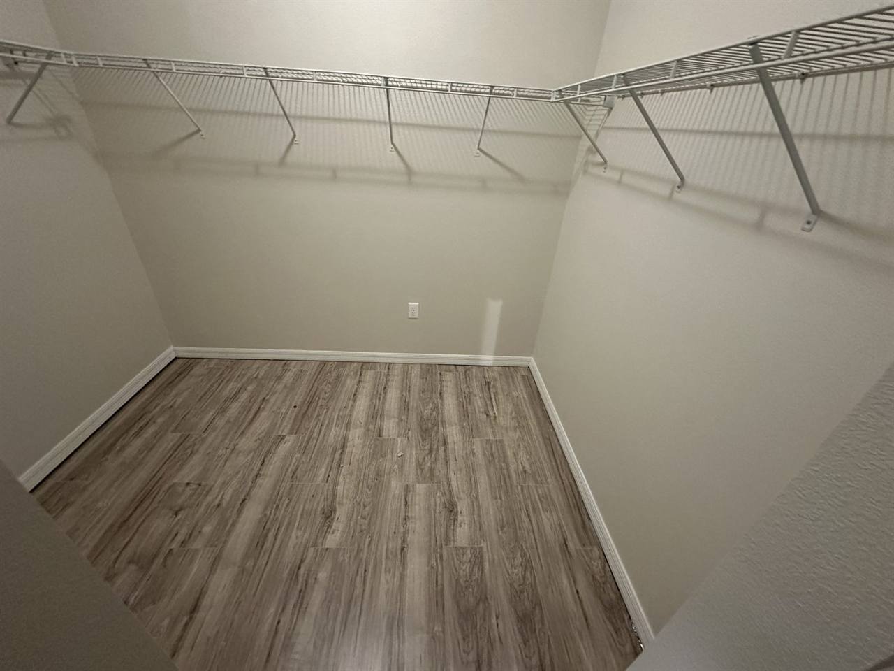 Walk-in closet wood look flooring