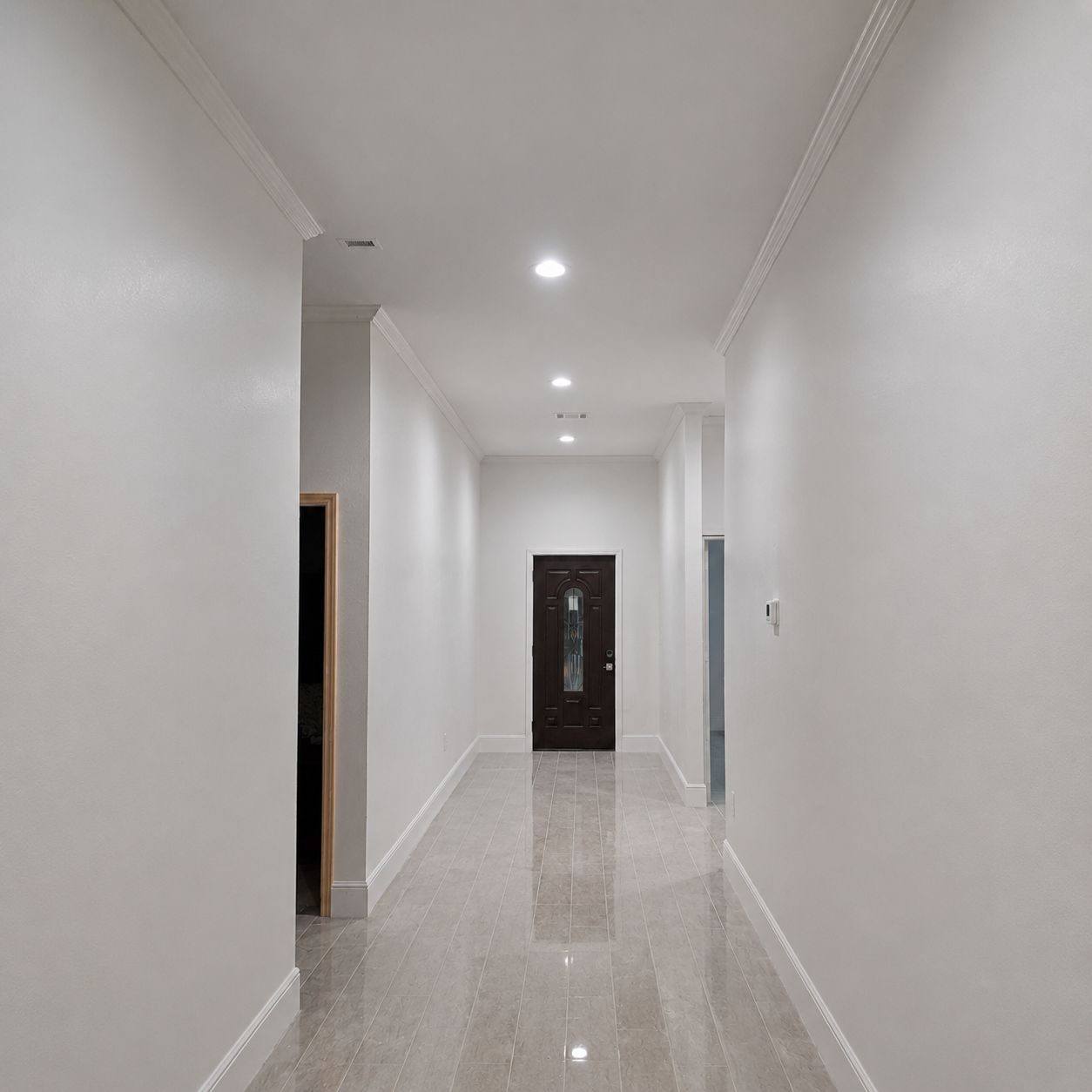 Interior hallway painting crown molding recessed lights